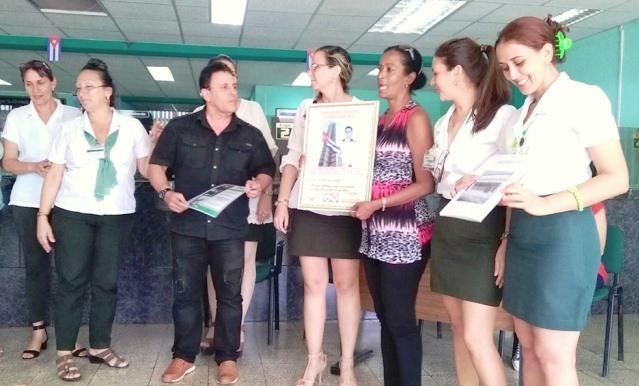 Imagen relacionada con la noticia :RECIBE LA SUCURSAL 5202 DEL BPA ESPIRITUANO LA CONDICIÓN DE COLECTIVO DISTINGUIDO DEL SECTOR BANCARIO